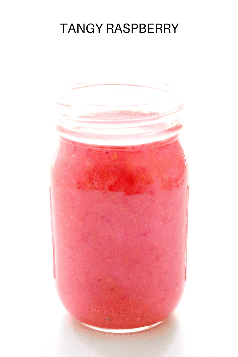 pink dressing in a glass mason jar