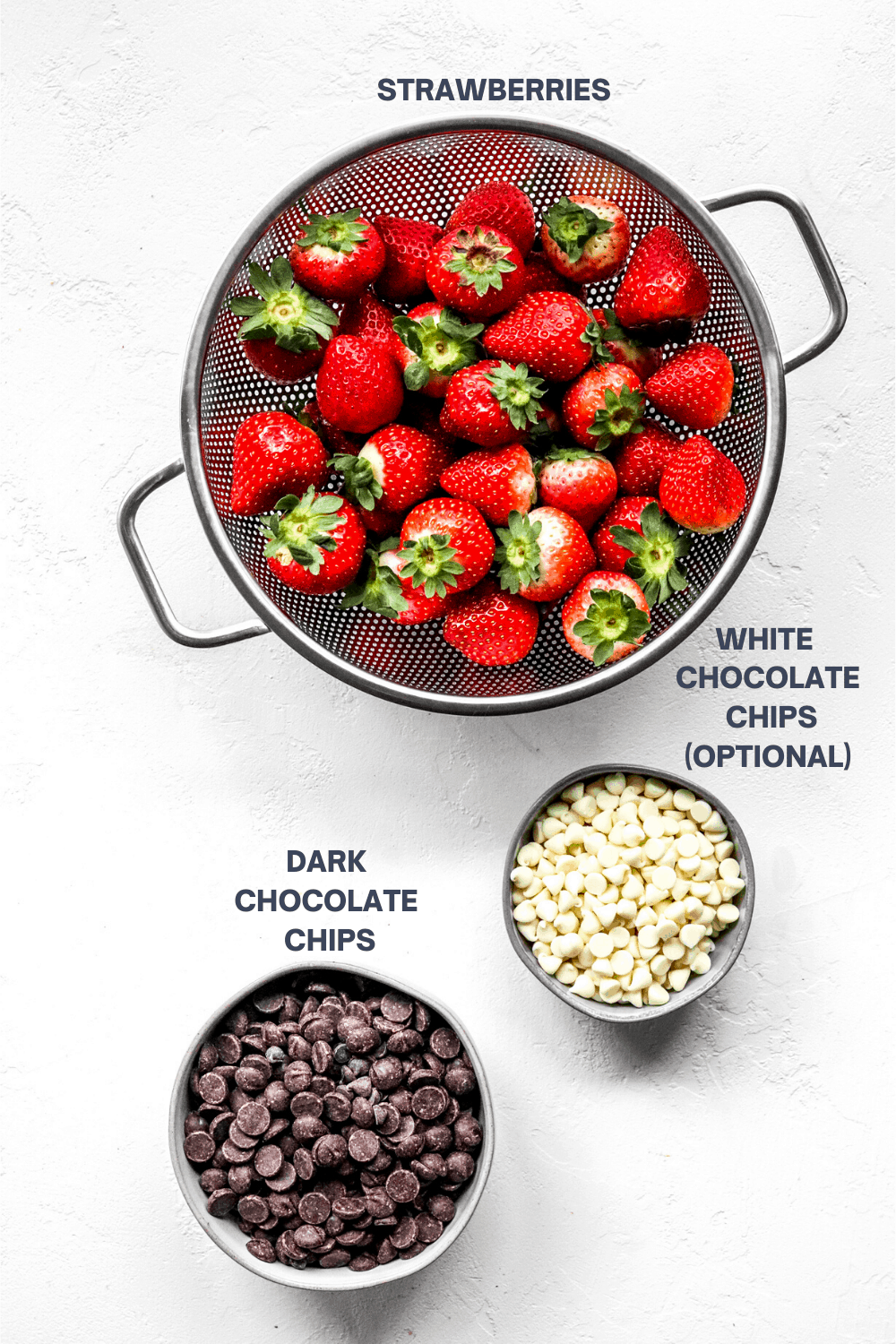 Ingredients for chocolate covered strawberries with labels over each ingredient. 