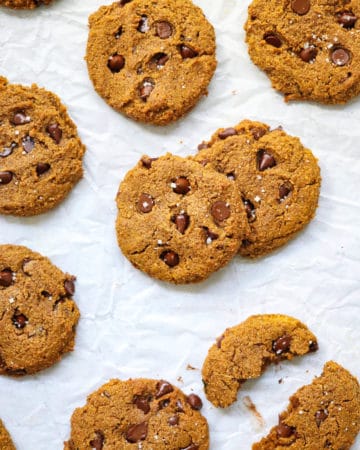 Pumpkin chocolate chip cookies on white paper