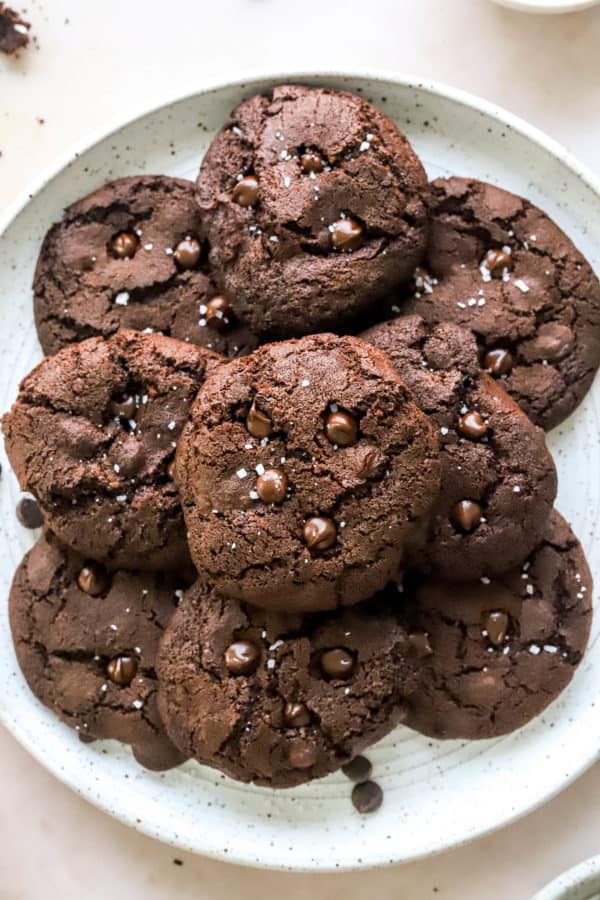 Pile of chocolate cookies on a plate.
