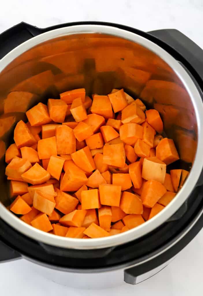Chopped sweet potatoes in an Instant Pot.