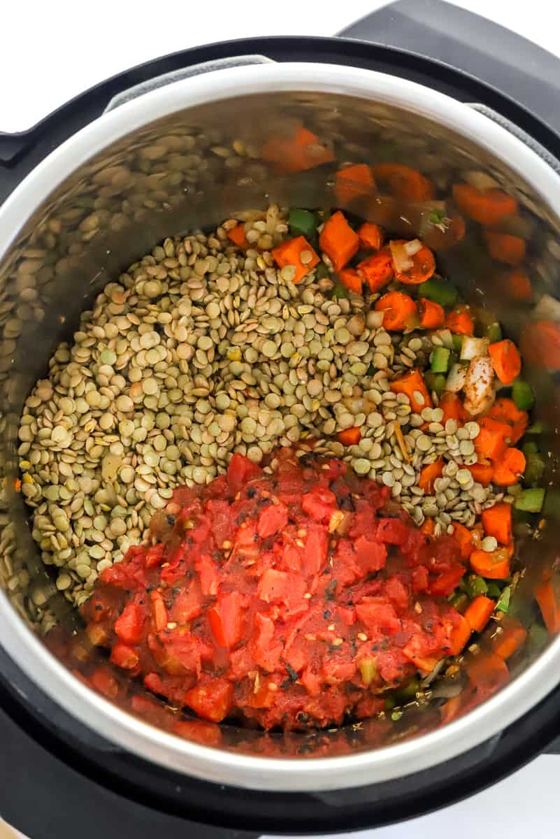 Brown lentils, cooked veggies and canned tomatoes in an instant pot.