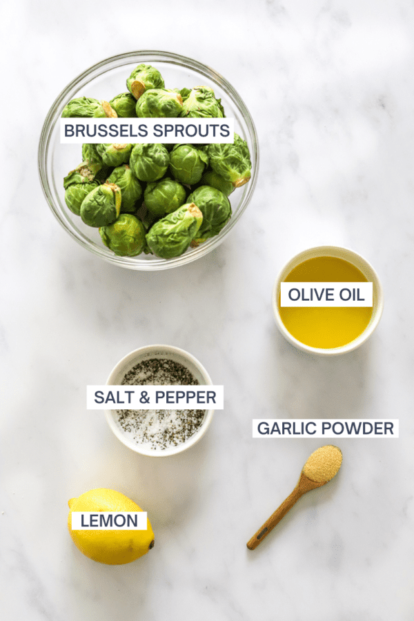 Ingredients for air fryer Brussels sprouts with labels over each ingredient.