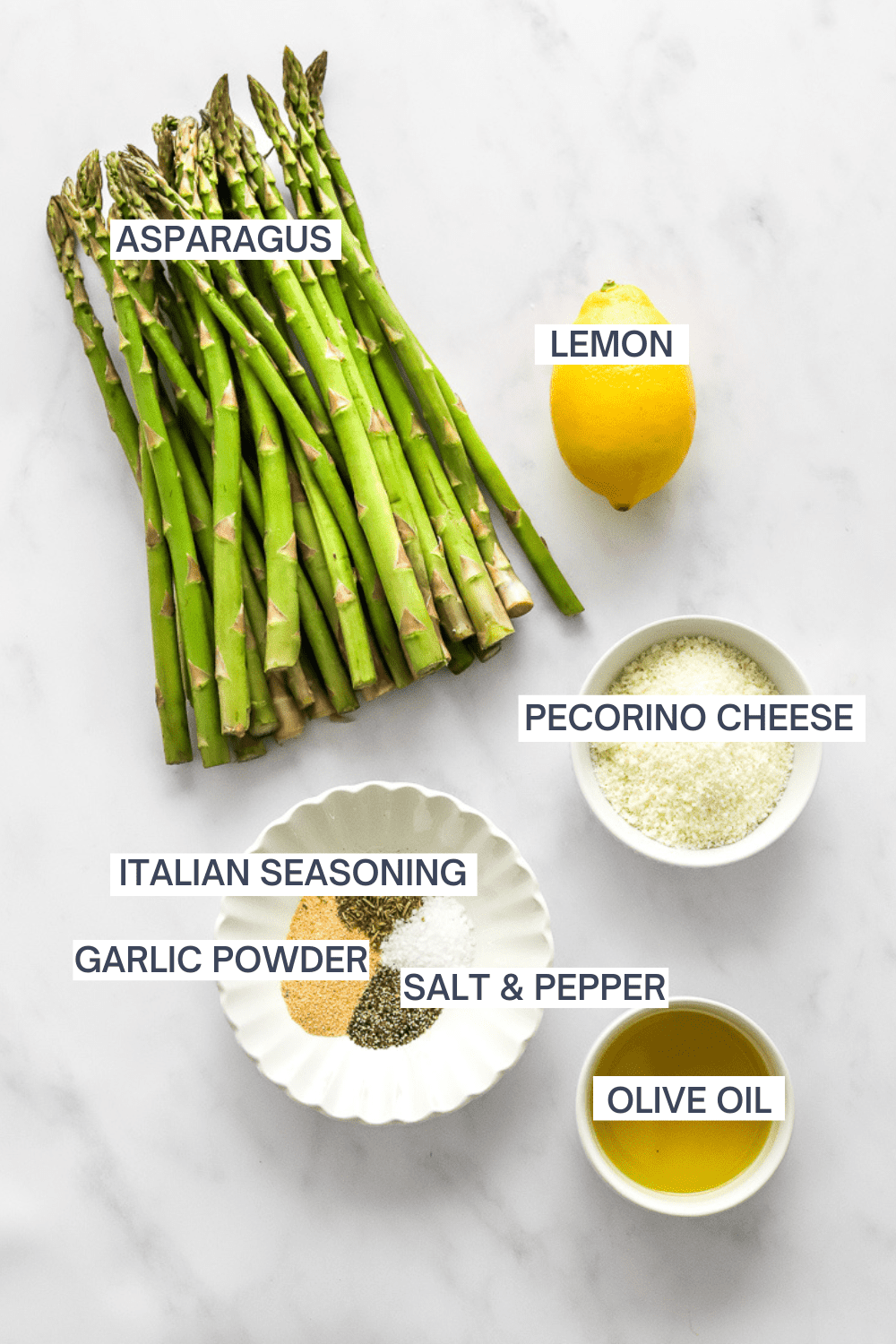 Ingredients for cooked asparagus with labels over each ingredient. 