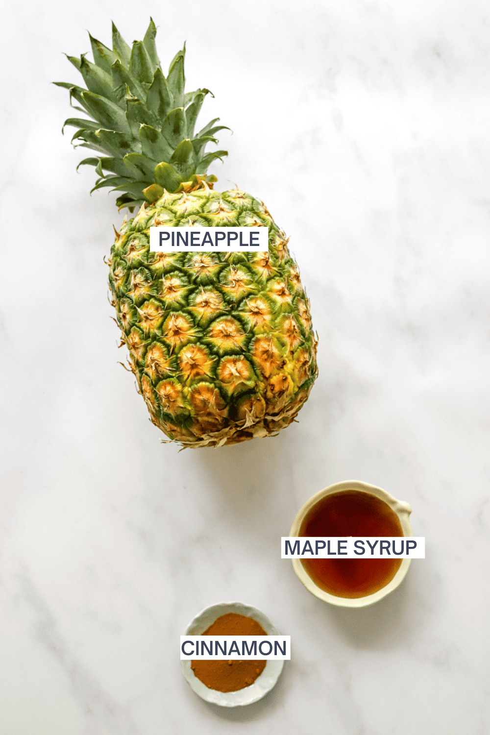 Ingredients for air fryer pineapple with labels over each ingredient. 