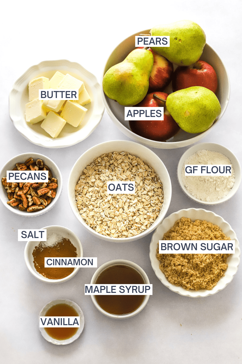 Ingredients for gluten-free apple pear crisp with labels over each ingredient.