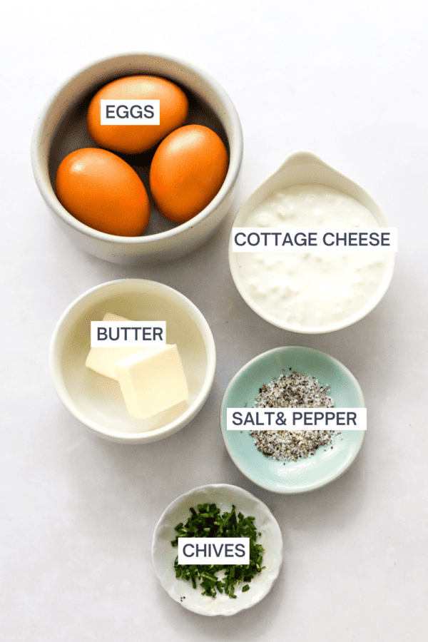 Ingredients for cottage cheese eggs with labels over each ingredient.