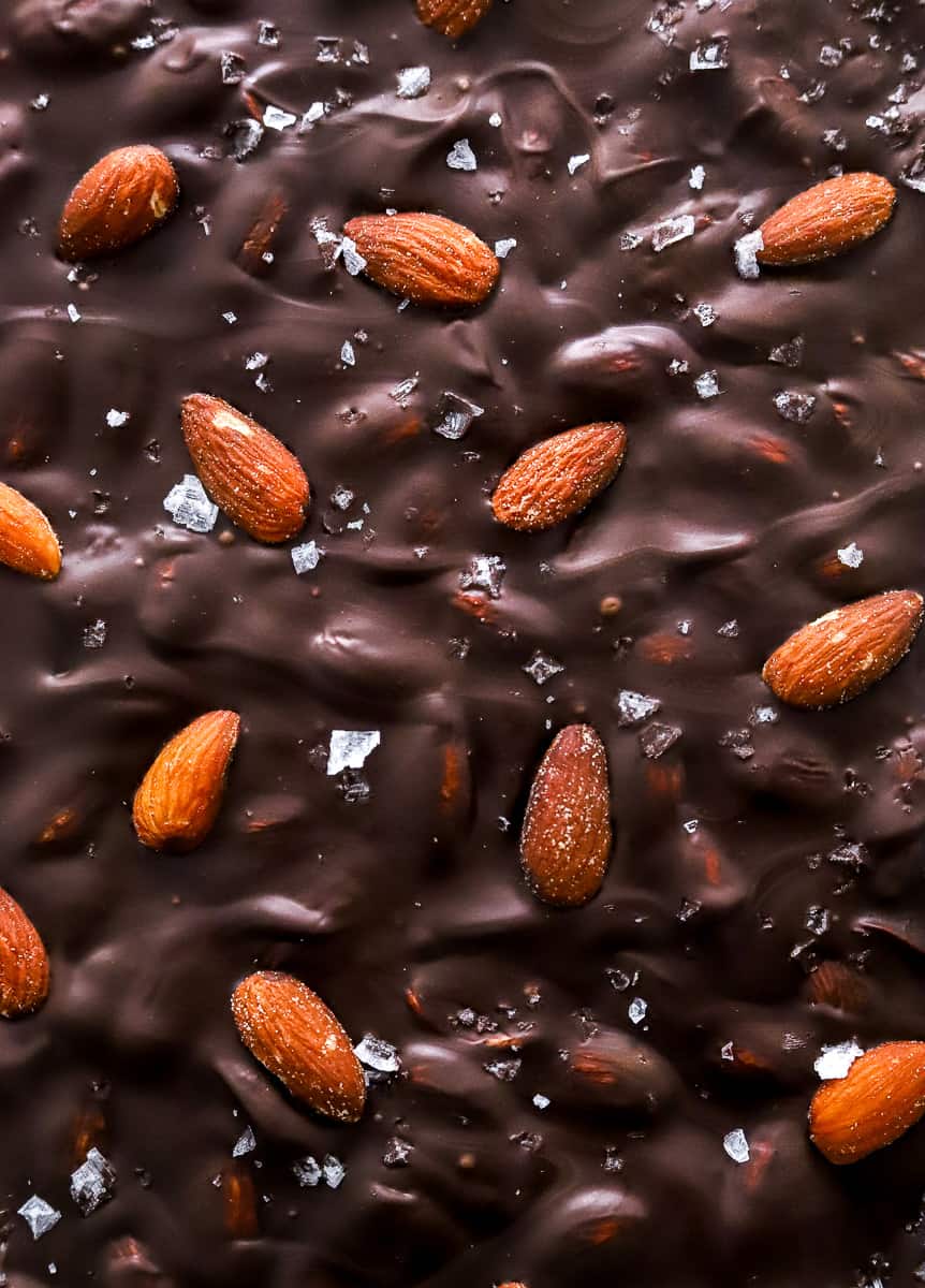 Smooth, set dark chocolate topped with roasted almonds and flaky sea salt.