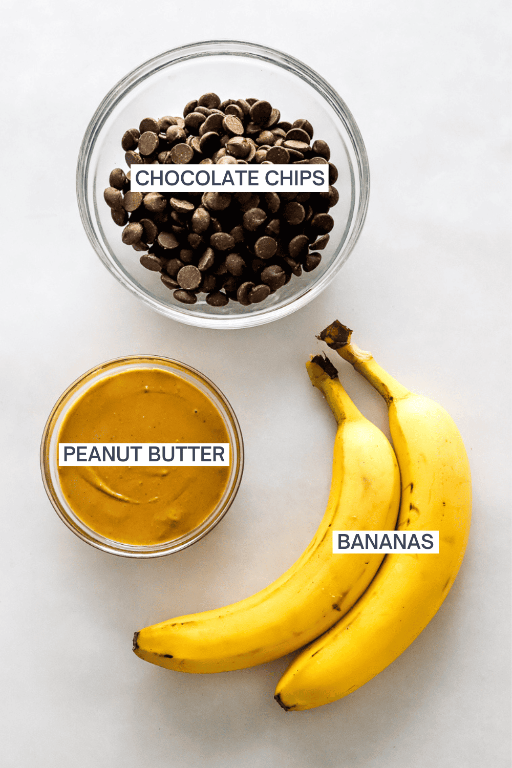 Ingredients for chocolate banana bark with labels over each ingredient.
