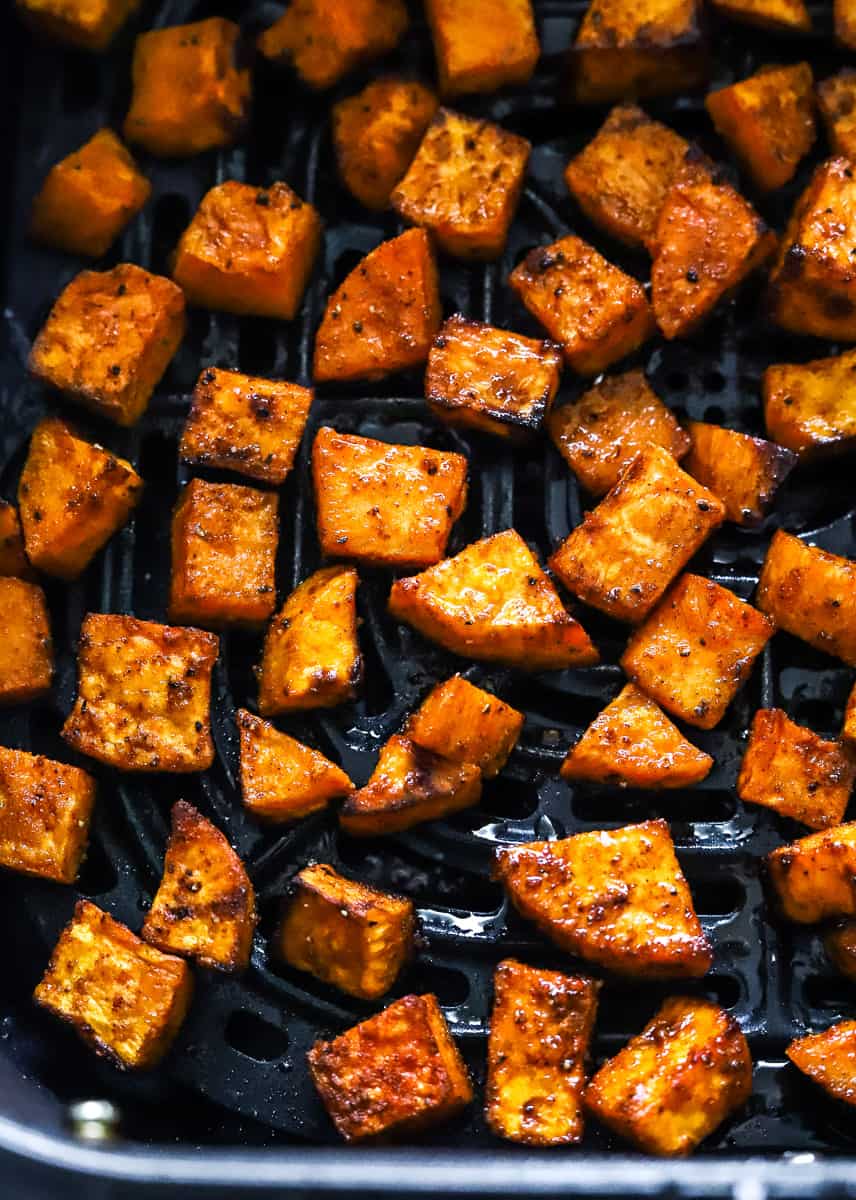 Cubed cooked sweet potatoes in the air fryer. 