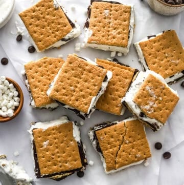 Cut scores bars on top of parchment paper with a knife in front of them.