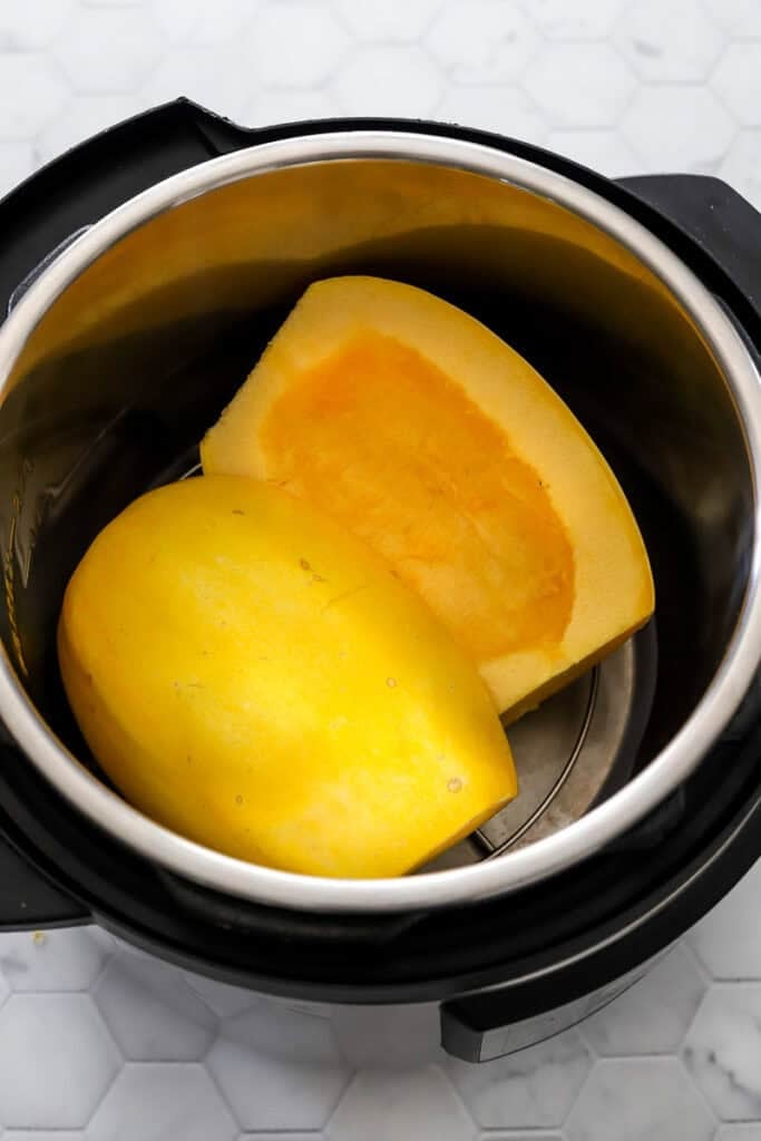 Halved yellow squash in an instant pot.