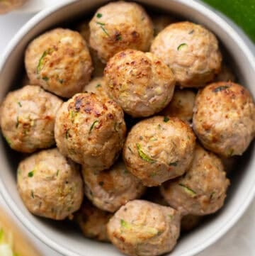 Bowl of cooked turkey zucchini meatballs.