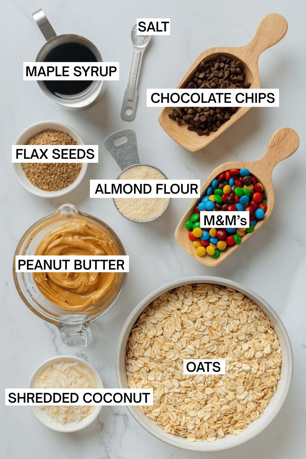 Ingredients for no cook monster cookie bites with labels over each ingredient. 