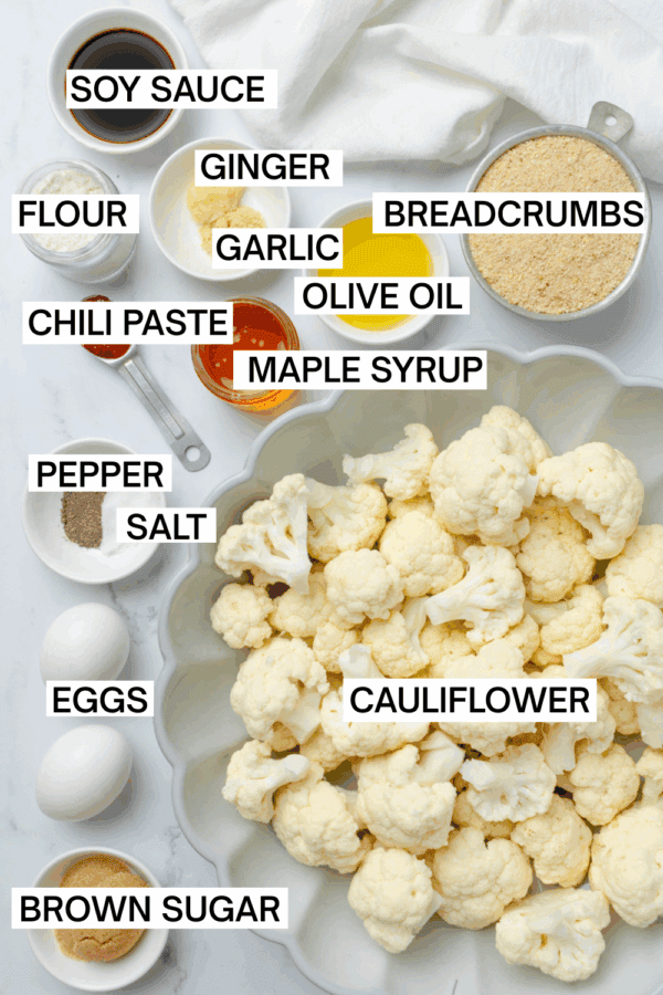 Ingredients for sweet and spicy cauliflower bites with labels over each ingredient.