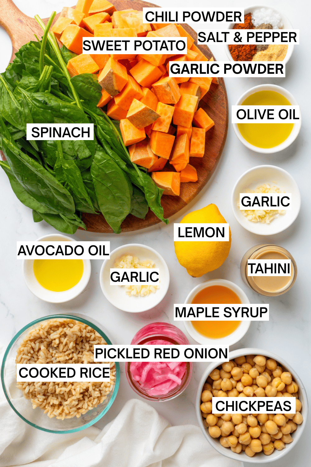 Ingredients for chickpea sweet potato bowl with labels over each ingredient.