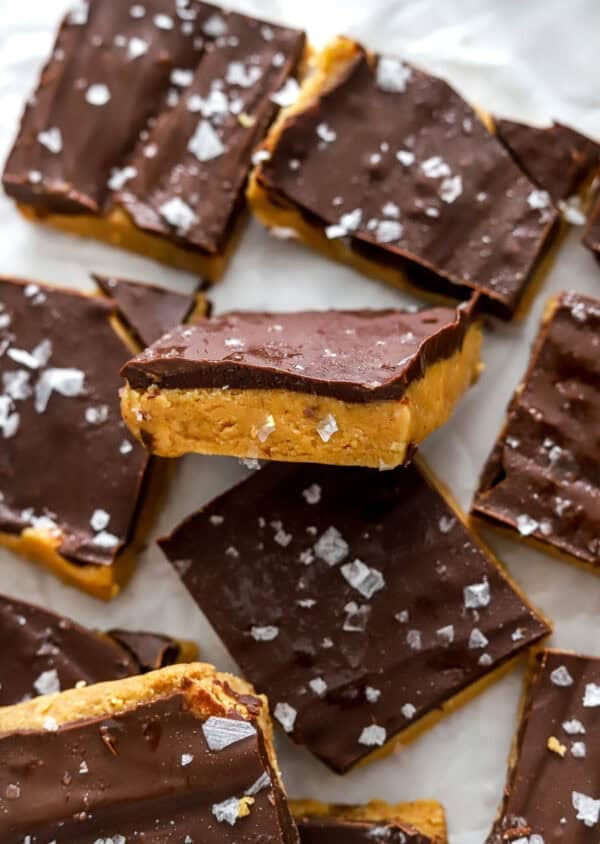 Cut chocolate covered bars with peanut butter base topped with sea salt.