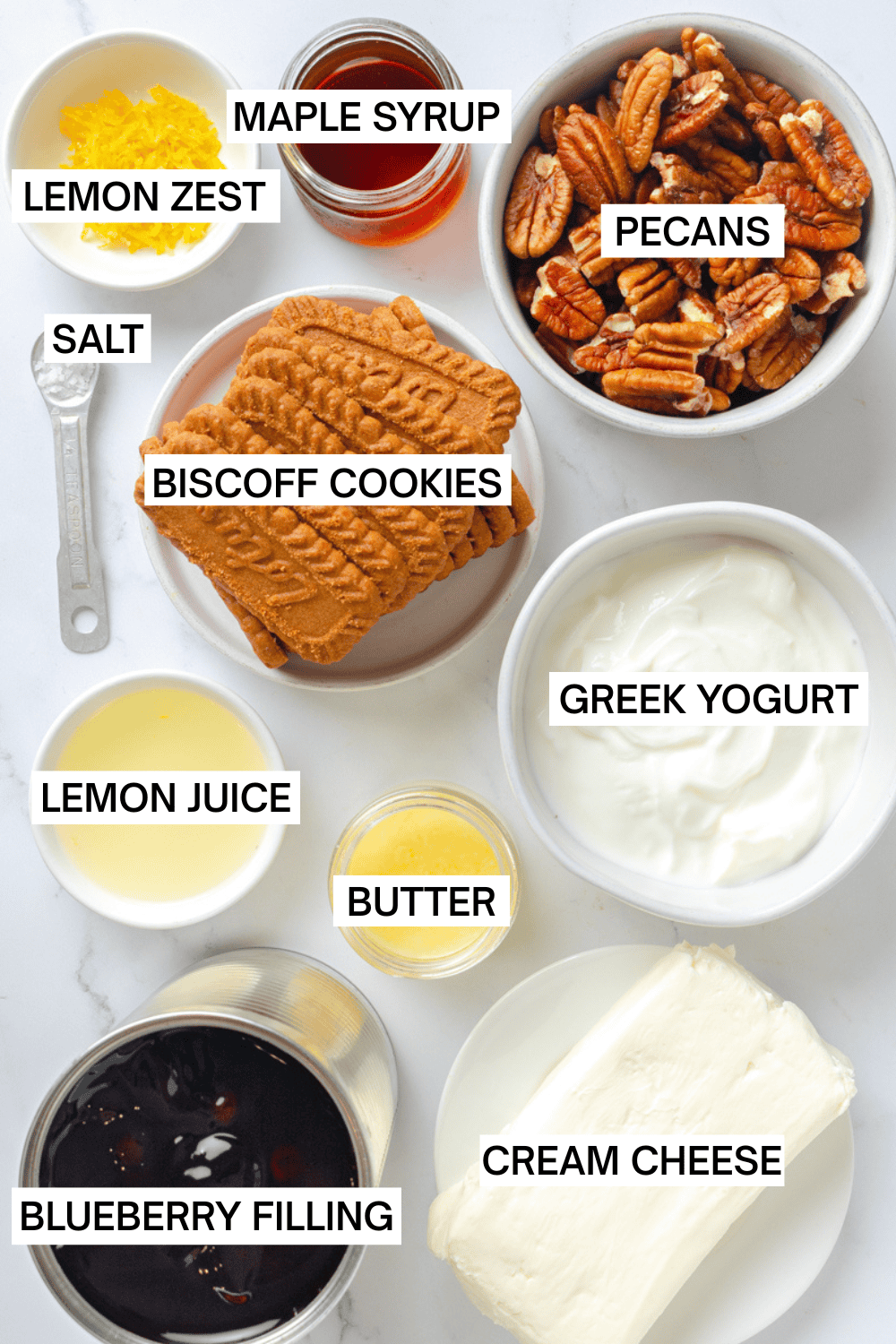 Ingredients for no bake blueberry parfaits in bowls with labels over each ingredient. 