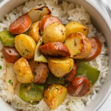 Bowl filled with air fryer sausage and potatoes.