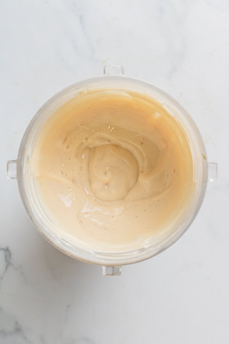 Blended cottage cheese mixture in blender bottle.