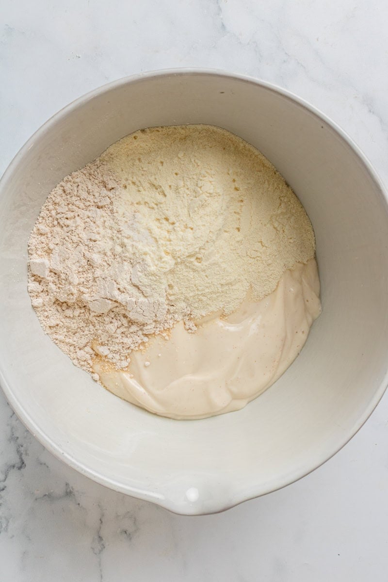 Cookie dough with cottage cheese mixture in bowl before adding chocolate chips.