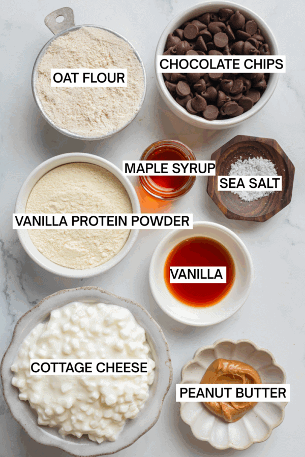 Cottage cheese cookie dough ingredients in bowls with labels over each ingredient.