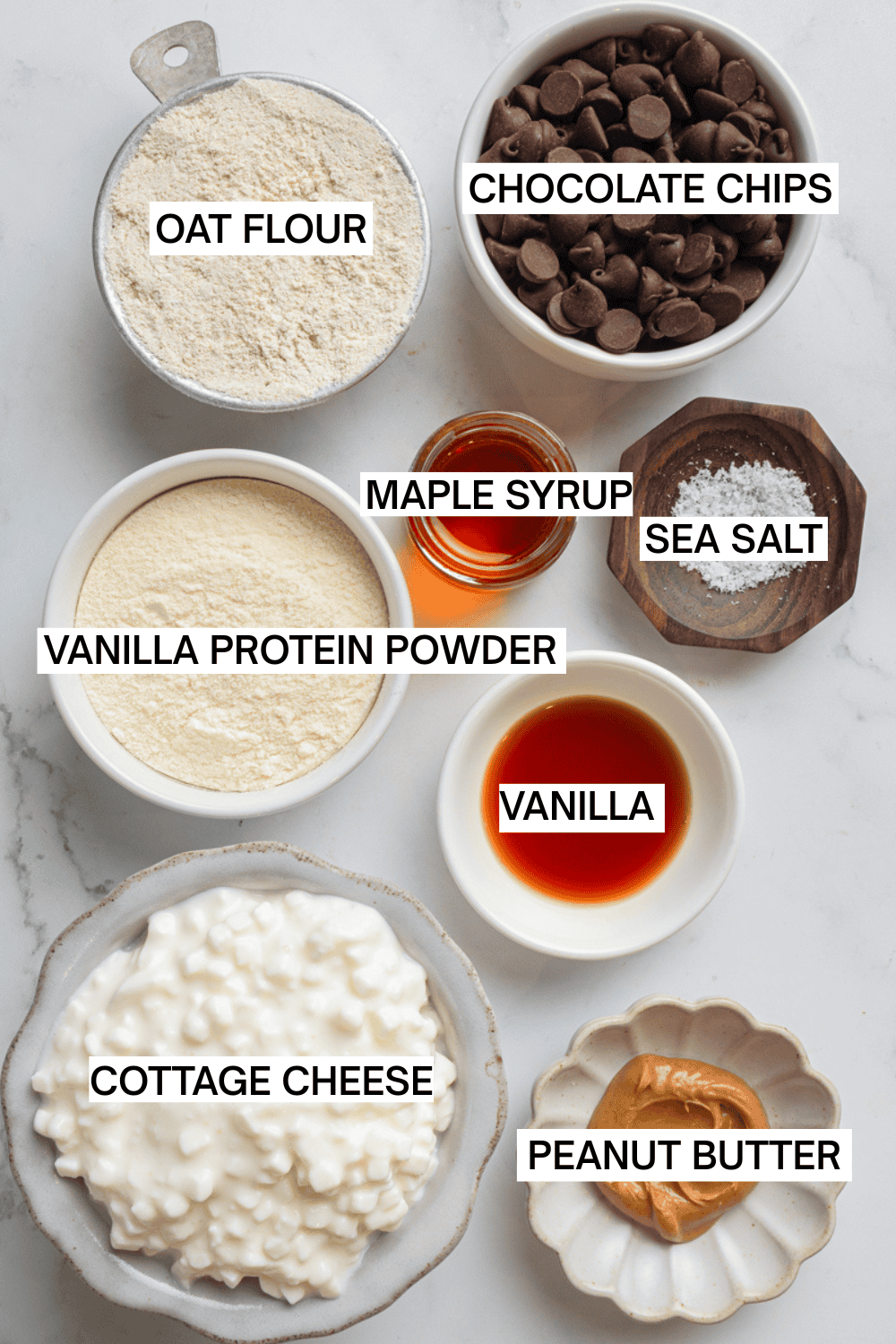 Cottage cheese cookie dough ingredients in bowls with labels over each ingredient.