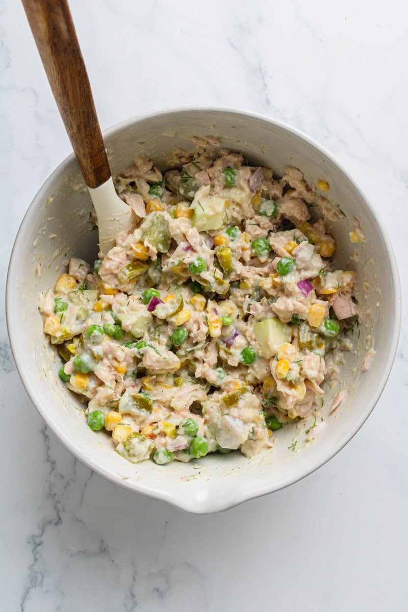 Tuna salad mixed in a mixing bowl. 