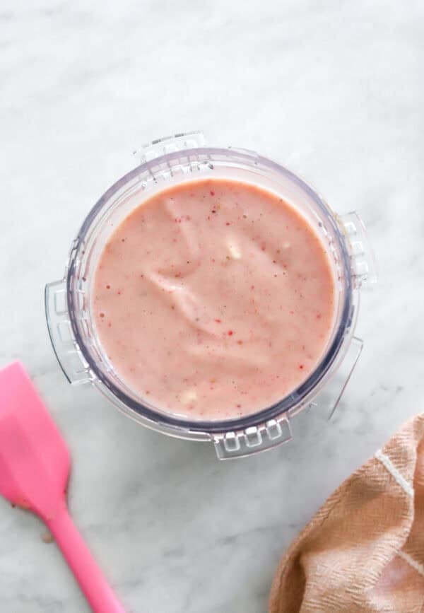 Strawberry Ninja Creami ice cream in a pint container.