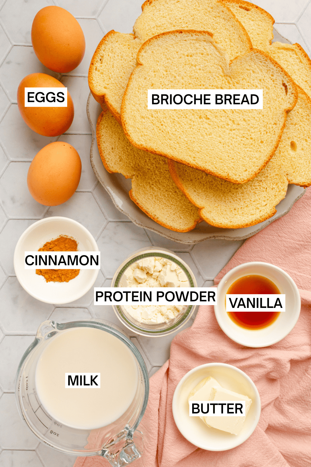Ingredients for protein powder French toast with labels over each ingredient. 