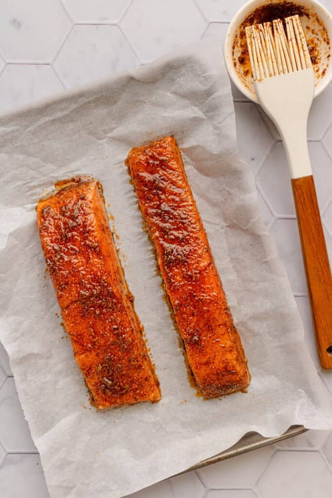 Seasoned uncooked salmon filets. 