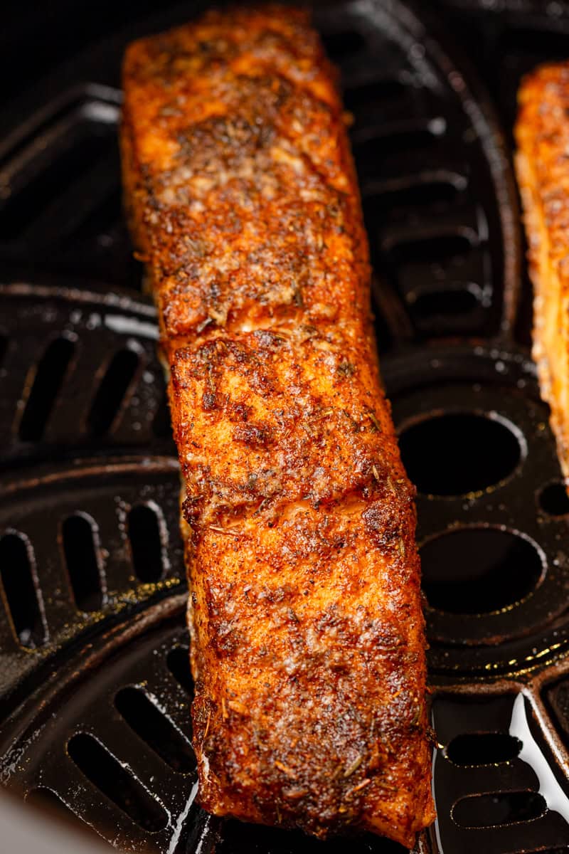 Golden air fryer salmon with cajun seasoning. 