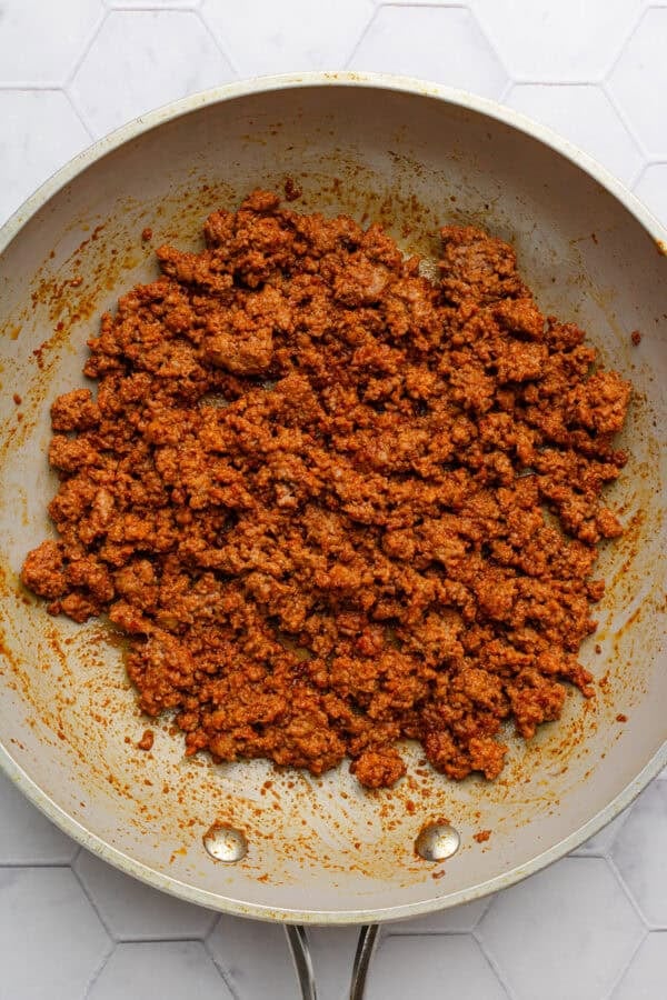Cooked ground beef taco meat in a skillet.