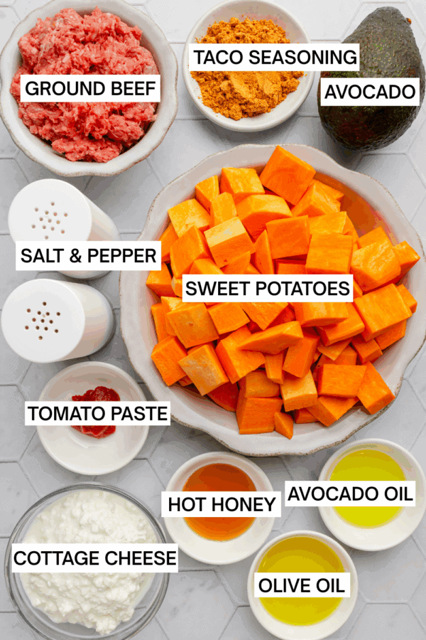Ingredients for ground beef sweet potato bowl in bowls with labels over each ingredient.
