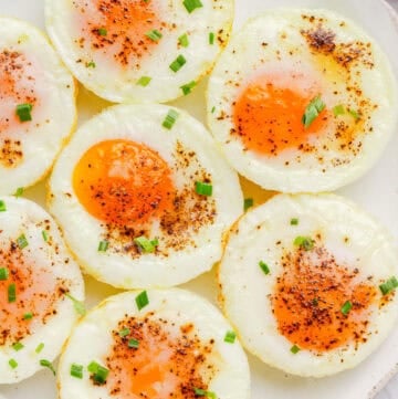 Plate of muffin tin cooked eggs.