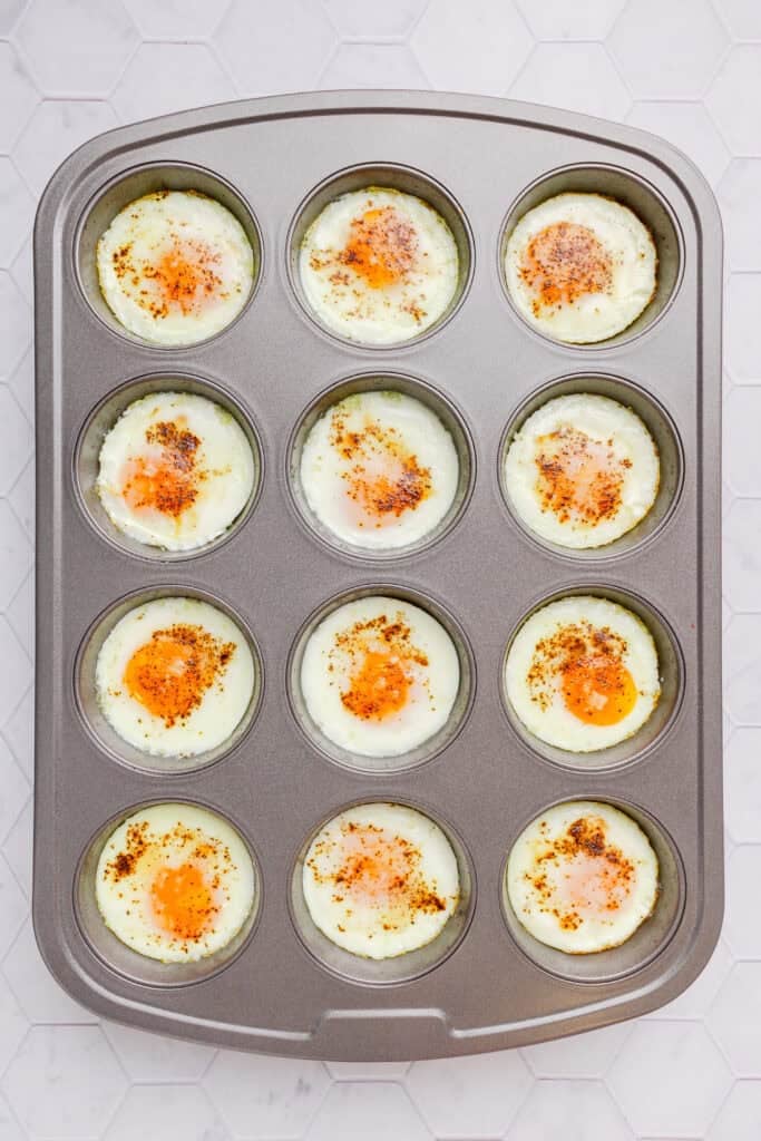 Whole baked eggs in a muffin tin pan. 