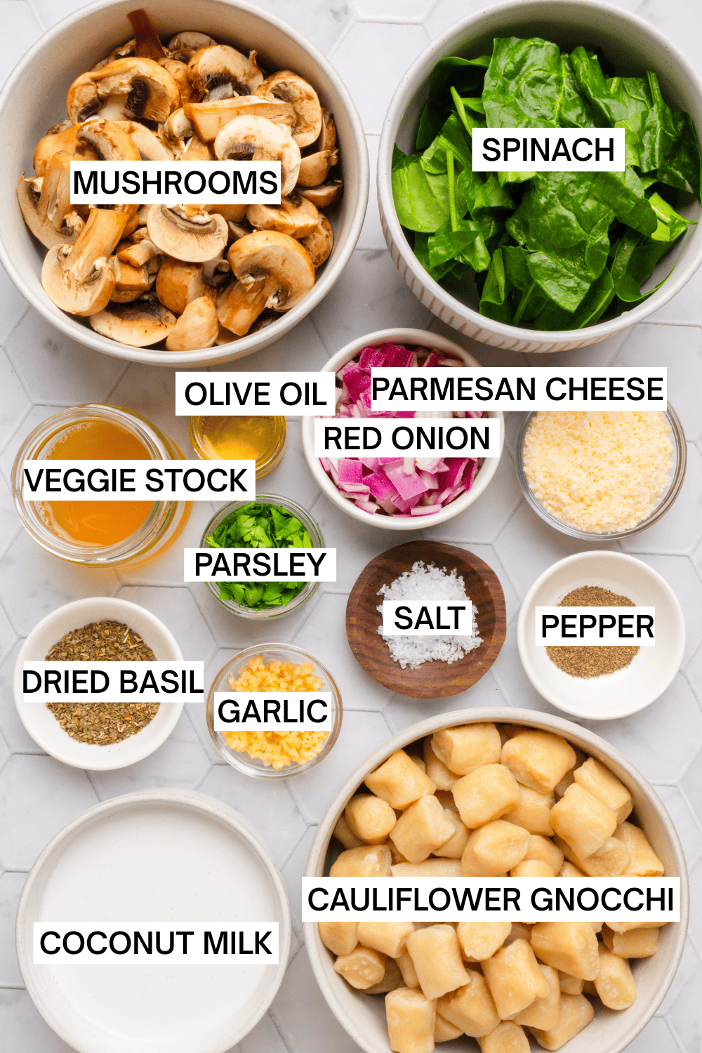 Ingredients for Trader Joe's cauliflower gnocchi in bowls with labels over each ingredient. 