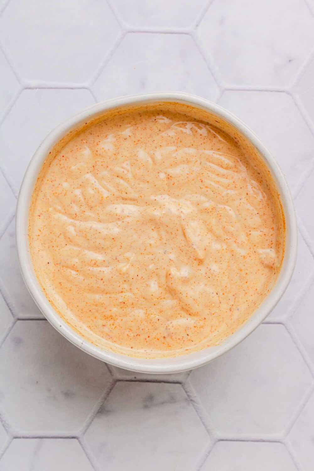 Tuna salad Mexican dressing mixed in a bowl.