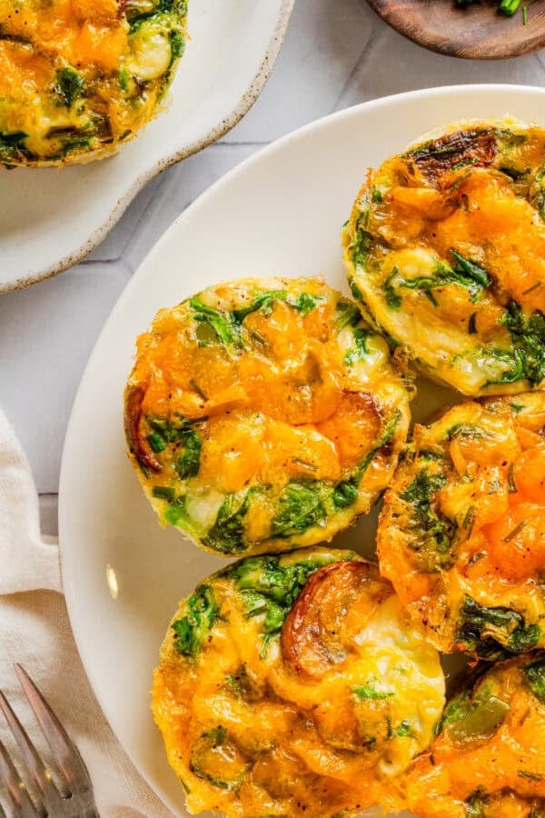 Plate of cheesy egg white muffin cups.