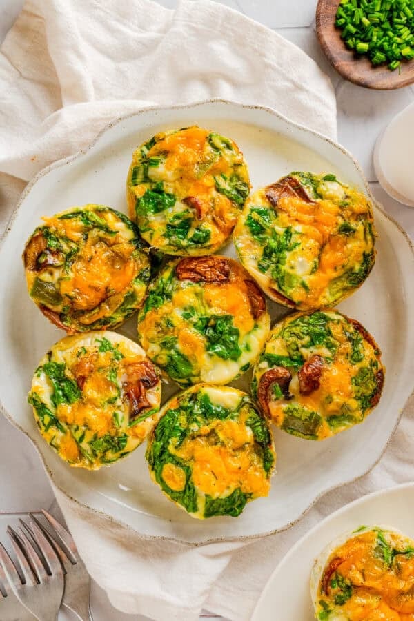 Plate of baked egg white veggie muffin cups.